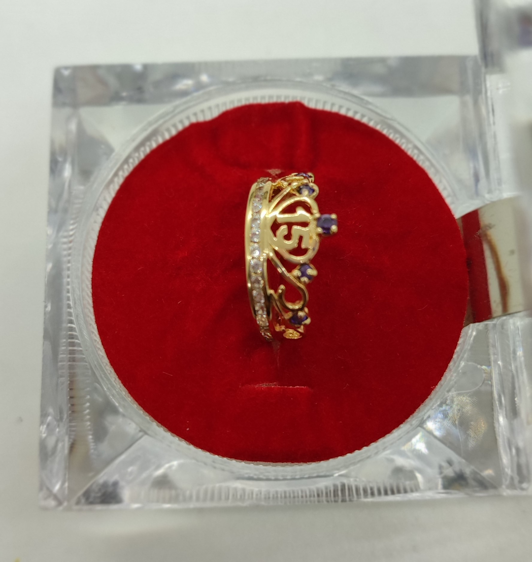 Anillo corona piedras moradas